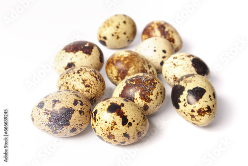 Quail eggs isolated on white background. Healthy food concept. Selective focus.