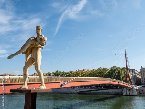 Statue The Weight of Oneself, Passarelle du Palais de Justice, Lyon, Auvergne-Rhone-Alpes, France photo