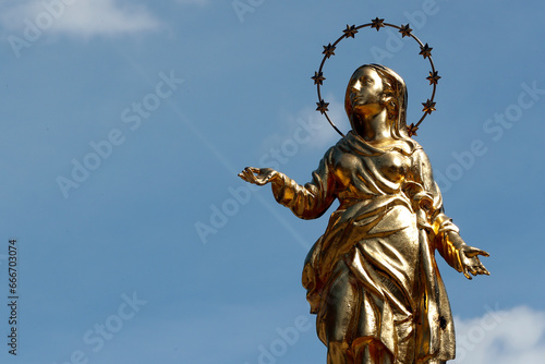 Golden Virgin statue with stars, Valgrisenche, Aosta Valley photo