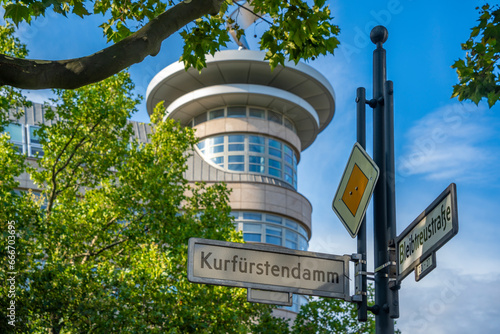 View of sign and building on the tree lined Kurfurstendam in Berlin, Germany