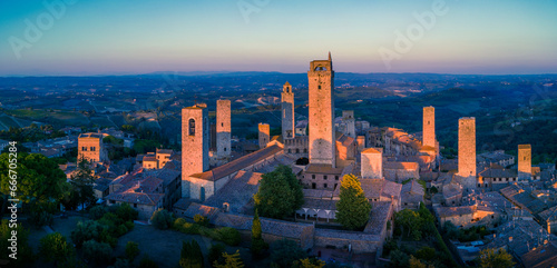 Elevated view of San Gimignano and towers at sunset, San Gimignano, UNESCO World Heritage Site, Tuscany photo