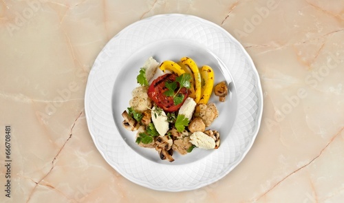plate of fresh tasty healthy salad with vegetables