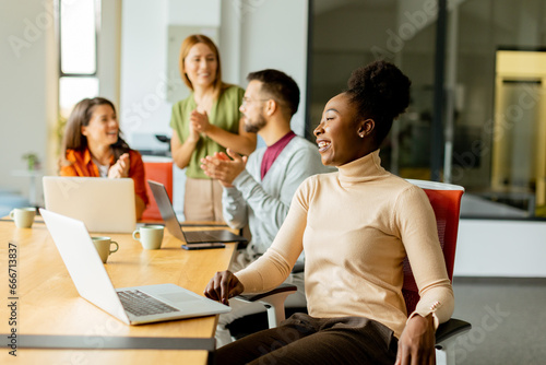 Young multiethnic startup team working in the modern office