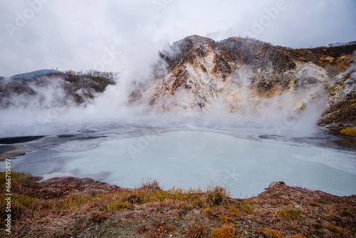 Volcanic field and steaming pond in Noboribetsu, Hell Valley, Hokkaido, Japan