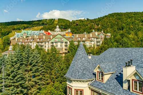 Mont Tremblant, beautiful national park and village in harmony with nature, Tiled roofs of hotels. The unique and wonderful resort village of Mont Tremblant, Quebec, Canada. High quality photo
