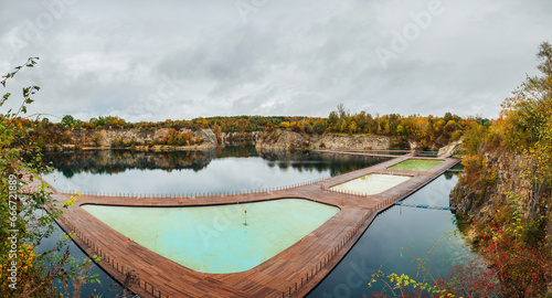 Aerial panoramic view of popular touristic location Zakrz  wek Quarry  Krakow. Floating swimming pool. Cloudy autumn day