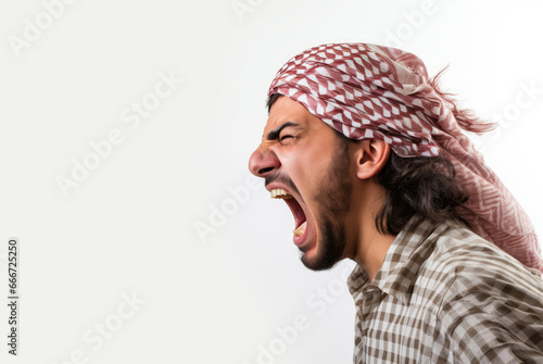 Middle Eastern Angst: Yelling Arab Profile. Furious Yelling Arab Man on White Background. yelling, shouting, rage, screaming. Isolated white background.  keffiyeh, kufiya photo