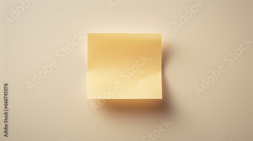 A vibrant yellow stick note displayed on a wall