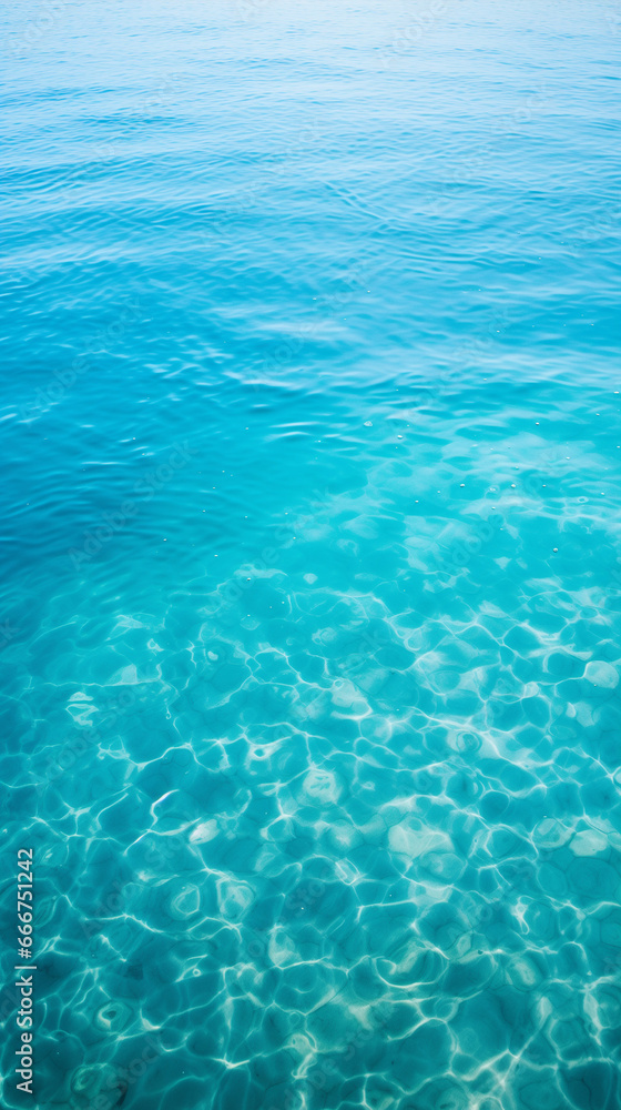 Clear, turquoise waters, serene ocean vibes, sunlit ripples, perfect for relaxation-themed content, summer aesthetics.