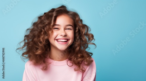 Back to School. Happy Young Girl on a Blue