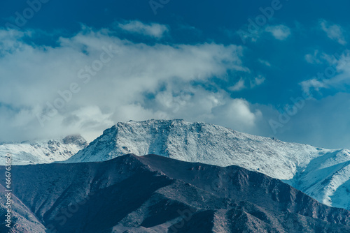 Picturesque mountain landscape with snowy peaks