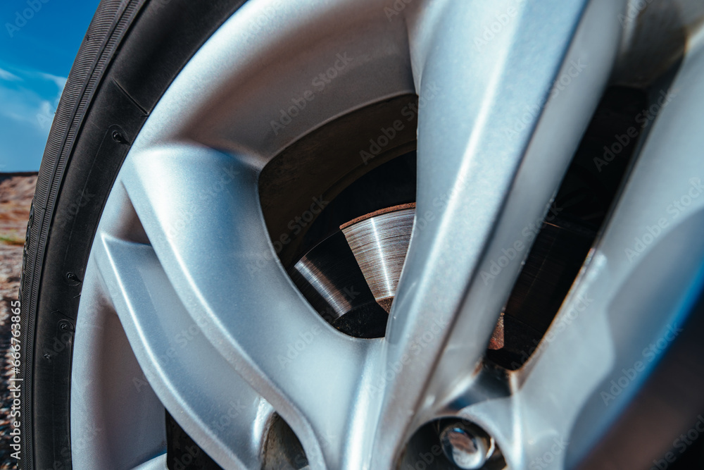Car wheel close-up view with brake disk