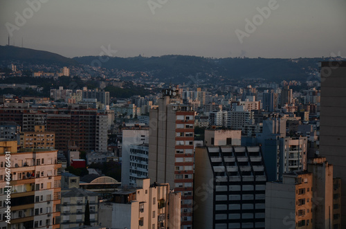 Aerial view of the skyline of the central area of Porto Alegre at sunset - clear sunset sky with few clouds