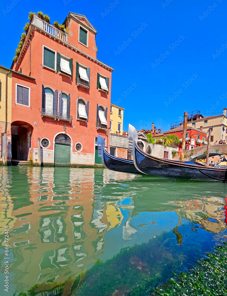  a canal in Venice in sunny day