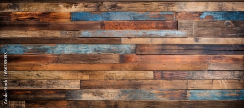 A textured setting with a distressed and timeworn look is created by incorporating reclaimed, recycled wood planks photo