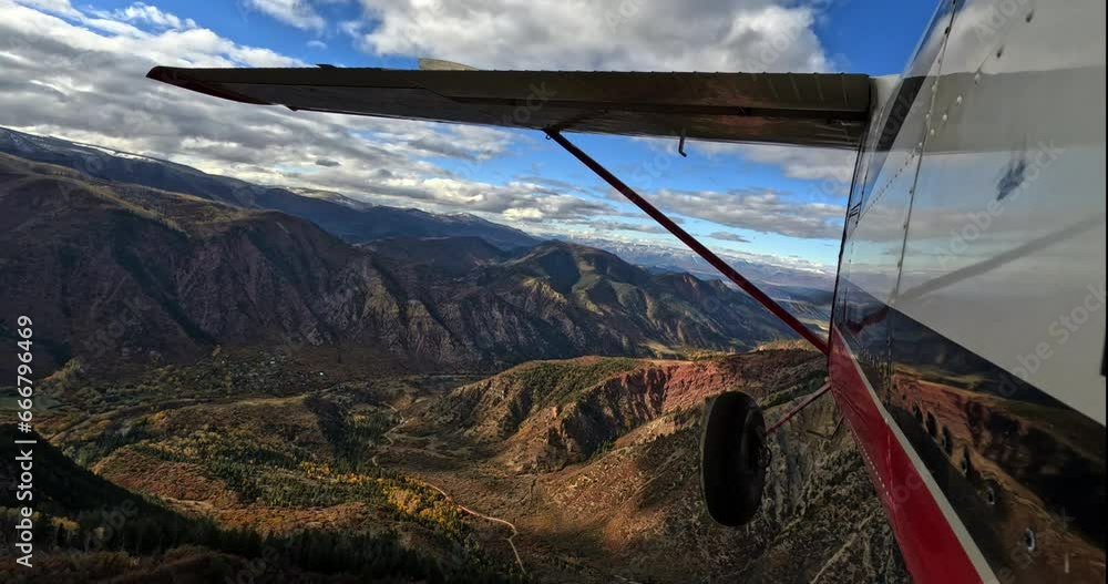 custom made wallpaper toronto digitalAirplane pov shot of wing flying through scenic mountains 