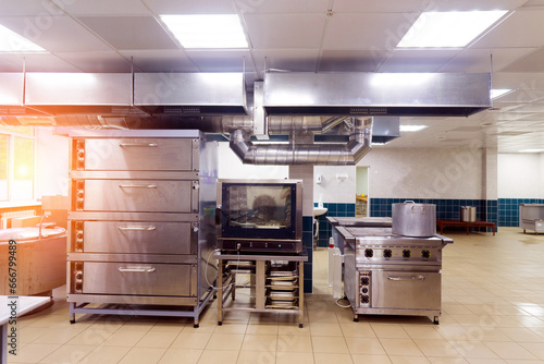 Fototapeta Naklejka Na Ścianę i Meble -  Restaurant kitchen equipment for preparing food, meal, plates, detail.