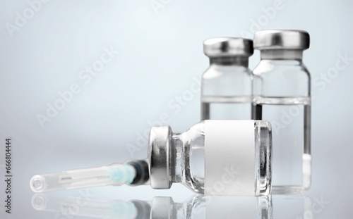 A single vial of injection on clinic desk