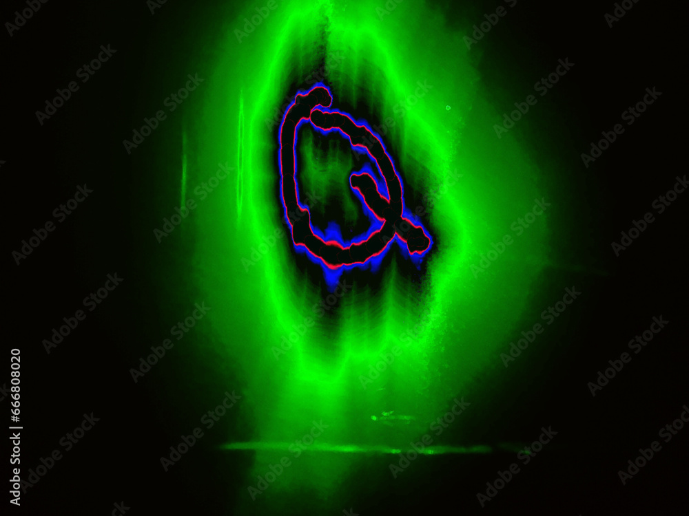 Glowing English letter Q. A letter of the English alphabet is ...