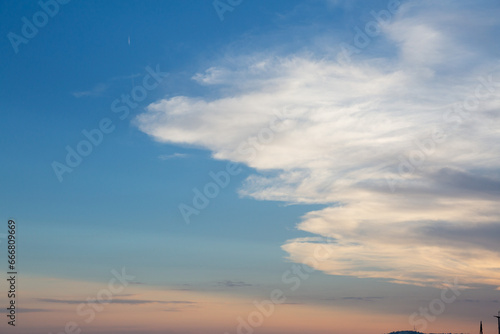 reddish clouds at sunset on a summer day