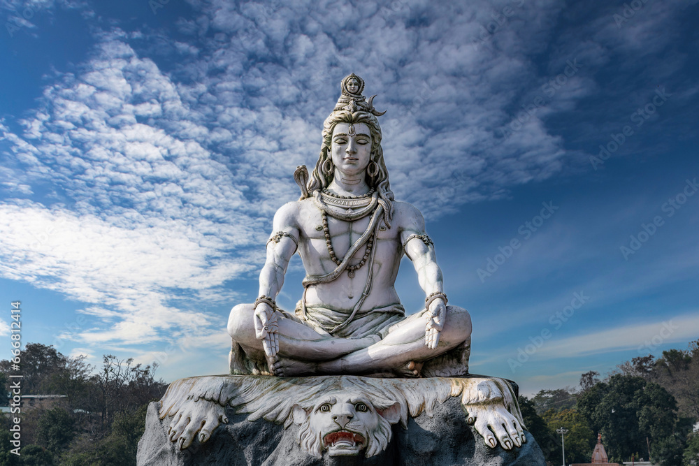 Shiva statue on the banks of the sacred Ganges River in Rishikesh, India.