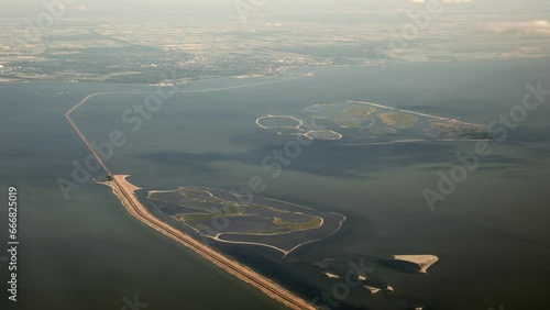 Aerial film, footage from the Marker Wadden, new manmade artificial islands with sandbanks and bird nature reserve, habitat, refuge, shelter along dike in The Netherlands, Europe photo