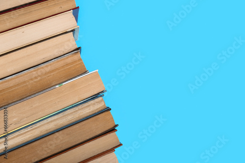 Row of books on blue background