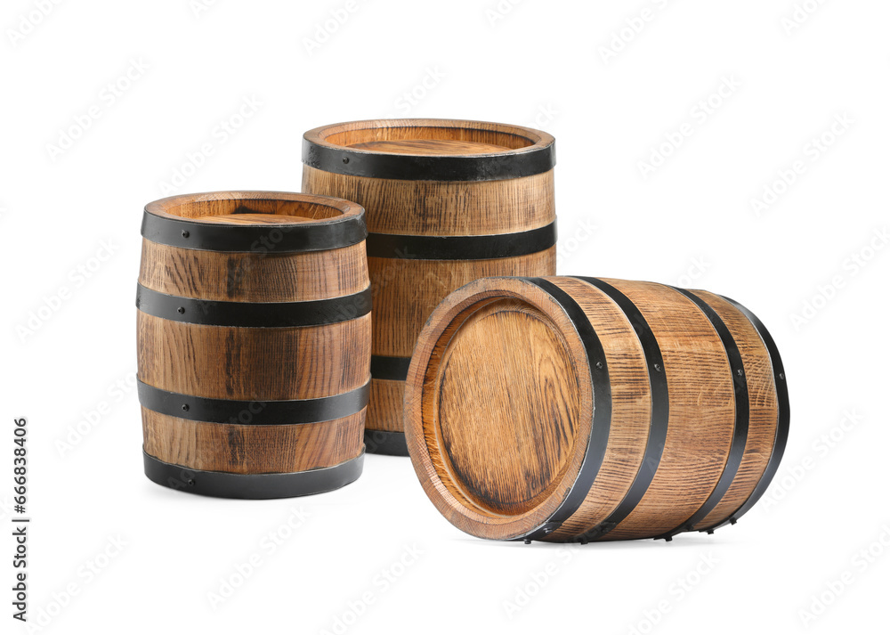 Set of many wooden barrels on white background Set of many wooden barrels on white background