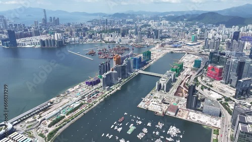 Drone Aerial Skyview of Royal Caribbean Spectrum of the seas Mega Luxury Cruise Ship dock anchor in Commercial construction development project in Kai Tak Sports Park Cruise Terminal in Kwun Tong Kowl photo