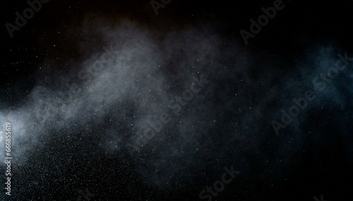 abstract real dust floating over black background