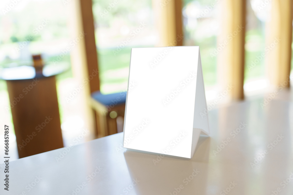 Mock up Menu frame standing on wood table in Bar restaurant cafe Mock up Menu frame standing on wood table in Bar restaurant cafe