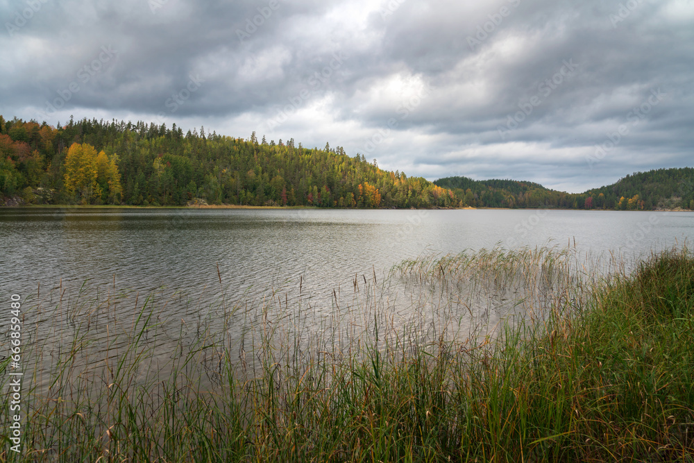 Lake Ladoga near the village Lumivaara on a sunny autumn day, Ladoga skerries, Lakhdenpokhya, Republic of Karelia, Russia Lake Ladoga near the village Lumivaara on a sunny autumn day, Ladoga skerries, Lakhdenpokhya, Republic of Karelia, Russia