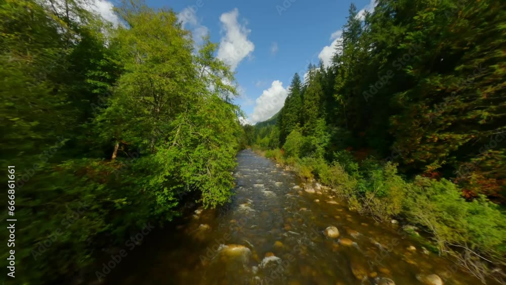 Flight over a mountain river. Shot on FPV drone. British Columbia, Canada. Flight over a mountain river. Shot on FPV drone. British Columbia, Canada.