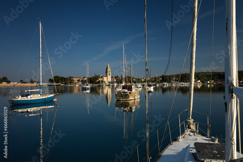 Panoramic view from a sailboat of Osor town skyline between Island of Cres and Mali Losinj - Croatia
