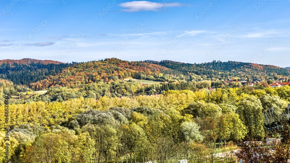 view of autumnal forest and meadows in mountains, Sanok, Poland