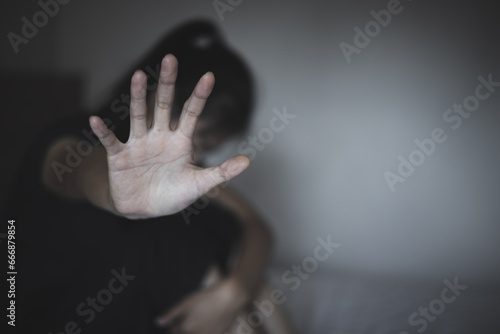 Fototapeta Concept of stop sexual harassment and violence against women, rape and sexual abuse concept, STOP gesture with hand, Stop drugs, human rights violations, human trafficking