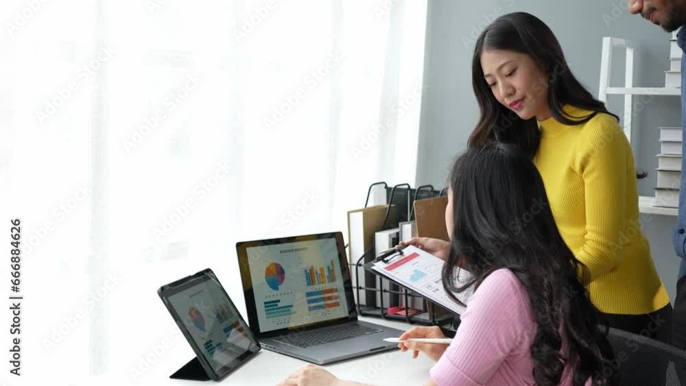 Business idea. Business people talk And calculations about charts and graphs showing the growth of investment results Of successful teamwork. Business idea. Business people talk And calculations about charts and graphs showing the growth of investment results Of successful teamwork.