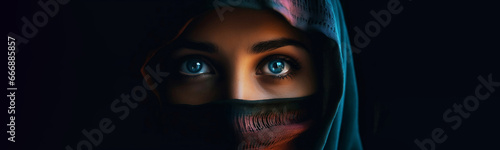 Horizontal banner. Close-up female portrait. Muslim tanned woman with blue eyes in burqa looks at camera. Concept of faith, god, arab world, palestine, islam. Head. Black background. Generative AI photo