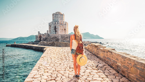 Woman tourist in Greece, Pelonnese, Messinia- the Methoni fortresse- travel, tour tourism,vacation photo