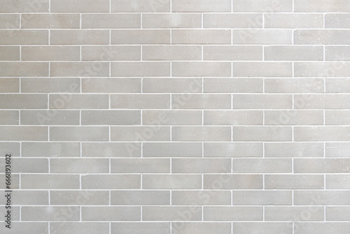 Vintage white brick tile wall pattern and background photo