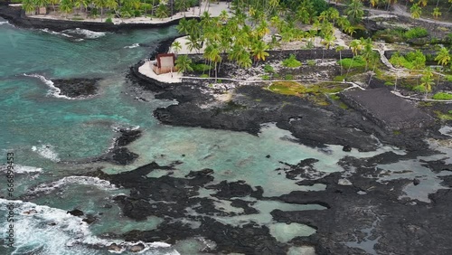 Aerial historical Pu uhonua o Honaunau bay Two Step Kona Hawaii.  Historical Park. Refuge protection. Home and burial to Hawaiian Chiefs. Big island of Hawaii. Sacred religious site. Tropical site. photo