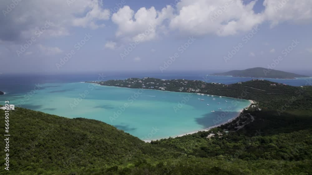 Stunning aerial view homes on mountain st. thomas magen's bay coki beach sapphire beach turquoise water waves blue sky white clouds east end red hook hills and mountains sun gleaming Stunning aerial view homes on mountain st. thomas magen's bay coki beach sapphire beach turquoise water waves blue sky white clouds east end red hook hills and mountains sun gleaming