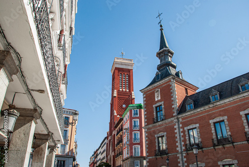 Architecture close to Plaza Mayor with statue of King Philip III (created in 1616) in Madrid, Spain