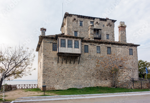 The old tower in Ouranoupoli village, Chalkidiki, Greece photo