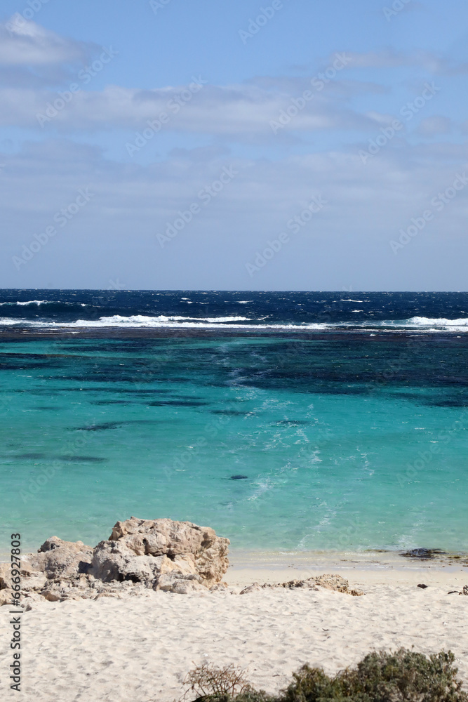 Beautiful coastal image of Rottnest Island off the West Australian coast. Showing clear water, waves, limestone rocks and vegetation Beautiful coastal image of Rottnest Island off the West Australian coast. Showing clear water, waves, limestone rocks and vegetation