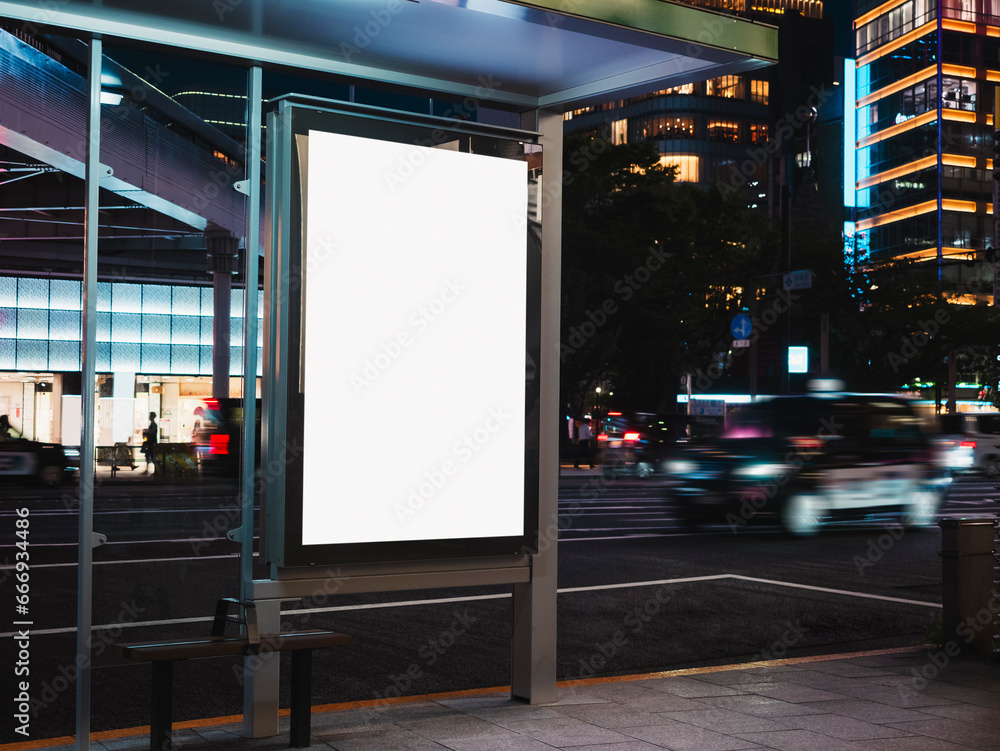 Mock up light box Banner Media Advertisement Bus stop City street at night