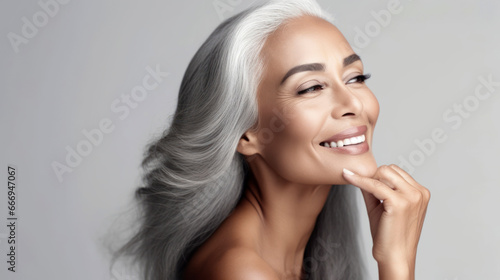 . Gorgeous aging mature woman with long gray hair and happy smiling. AI Generative photo