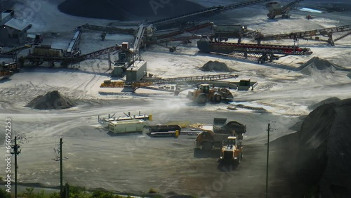 Workers and machinery at large mining quarry in Stittsville in Canada photo