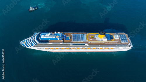 Cargo Container ship with contrail in the ocean ship carrying container and running for import export concept technology freight shipping by ship.