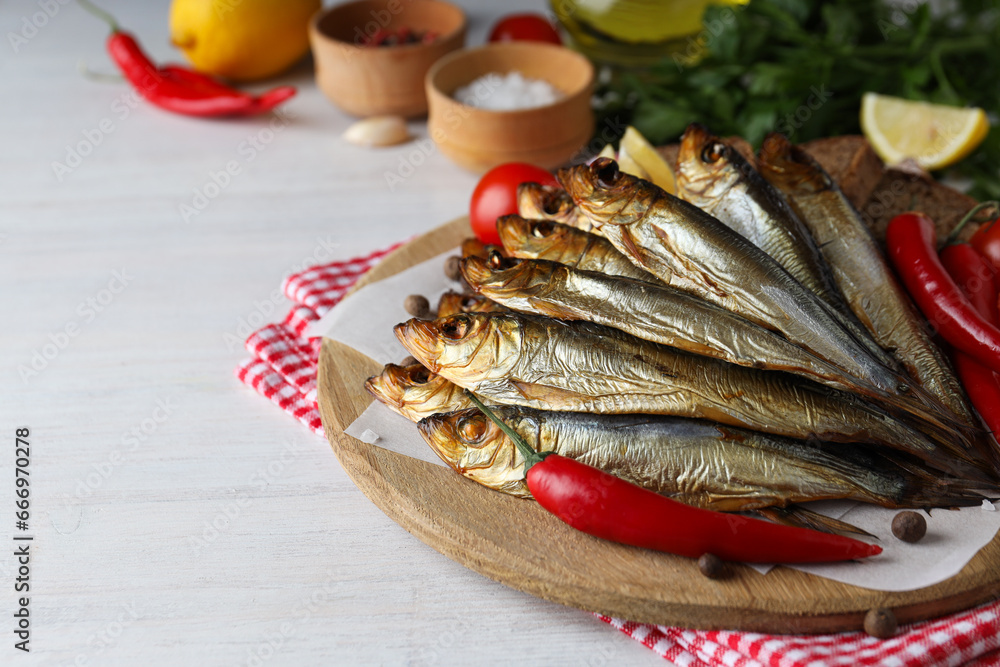 Concept of tasty food - delicious smoked fish Concept of tasty food - delicious smoked fish